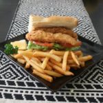 Freshly fried catfish stacked on fresh French bread. Served "dressed" with lettuce, tomato, and pickles with a choice of regular or chipotle mayonnaise. 6 inch version.