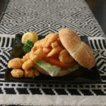 Crispy fried shrimp piled on a bun Served "dressed" with lettuce, tomato, and pickles with a choice of regular or chipotle mayonnaise.